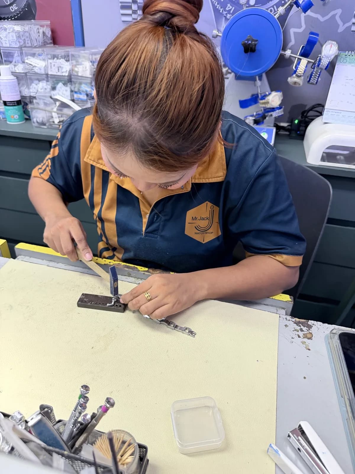 Staff at the repair bench